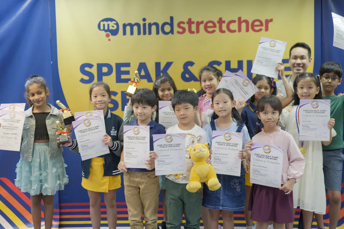 Student on stage at the Speak and Shine showcase